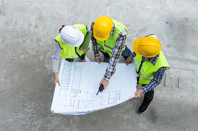 Top View Of Asian Engineer Or Young Female Architect Put On A He